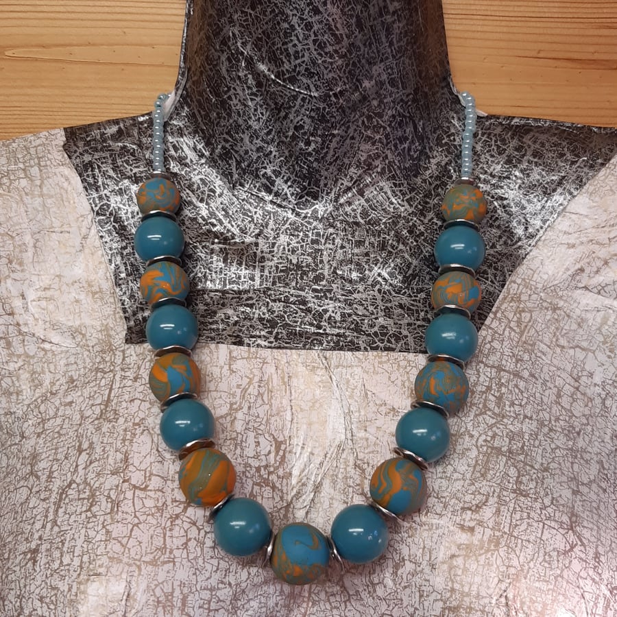 Turquoise and orange polymer clay necklace