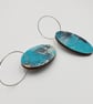 Oval shaped earrings in a watery effect print, blues, white, grey and pink - Image 4