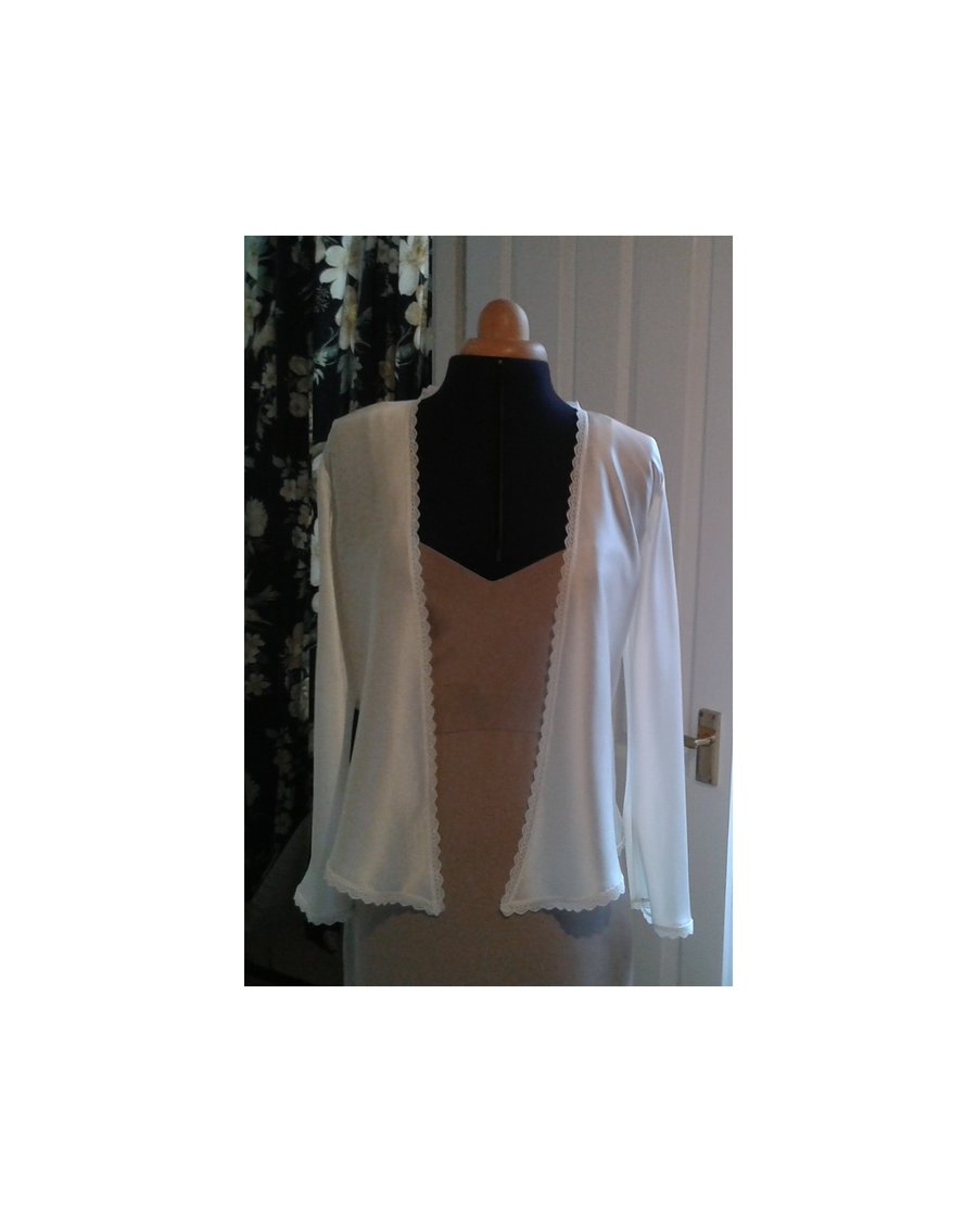 Ivory jacket with lace trim handmade from ivory silk satin and English lace