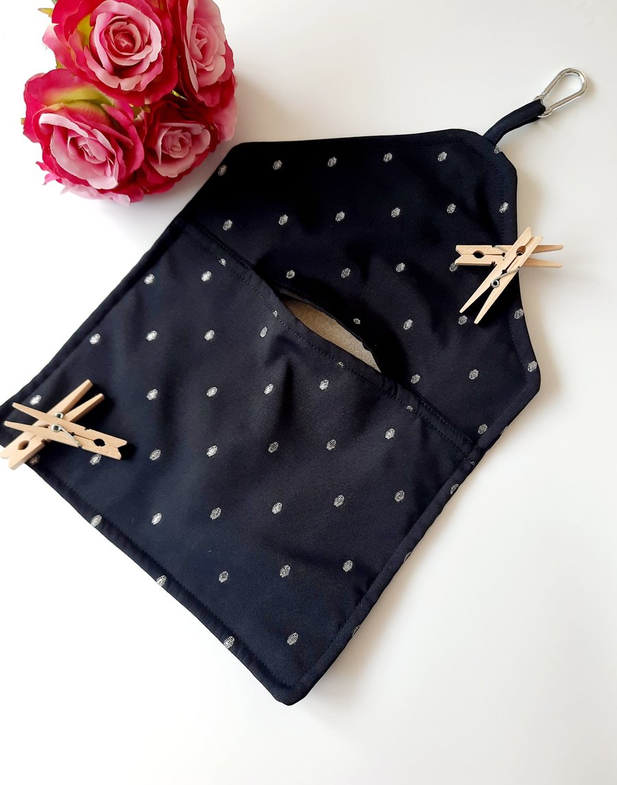 Black and silver embroidered dotty clip on pag bag.