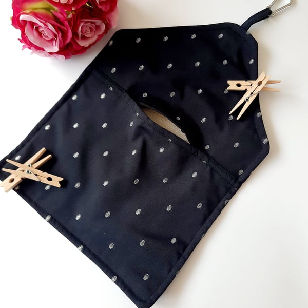 Black and silver embroidered dotty clip on pag bag.