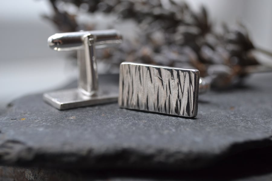 Silver bark textured cufflinks. 