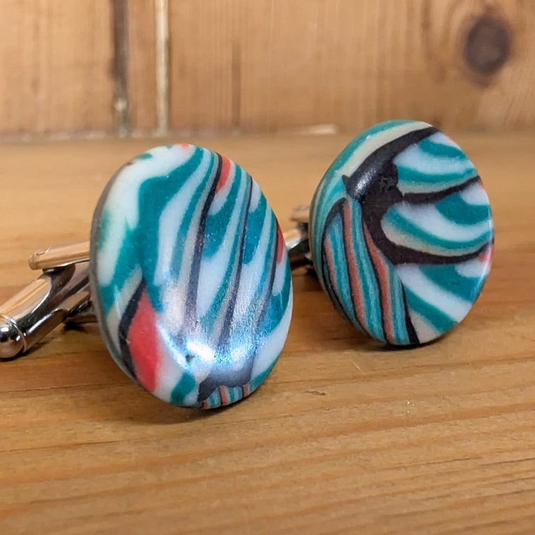 Teal and orange swirl effect cufflinks 