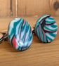 Teal and orange swirl effect cufflinks 