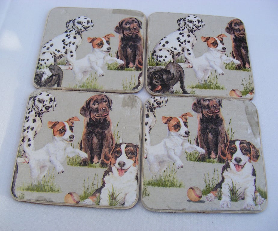 Set of 4 decoupaged jack russell and friends dog coasters.
