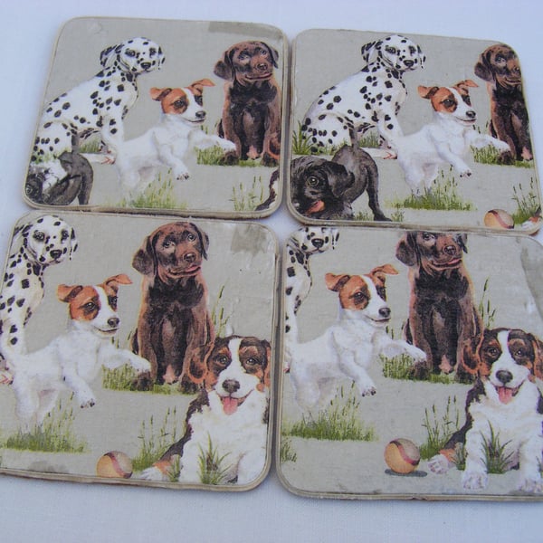 Set of 4 decoupaged jack russell and friends dog coasters.