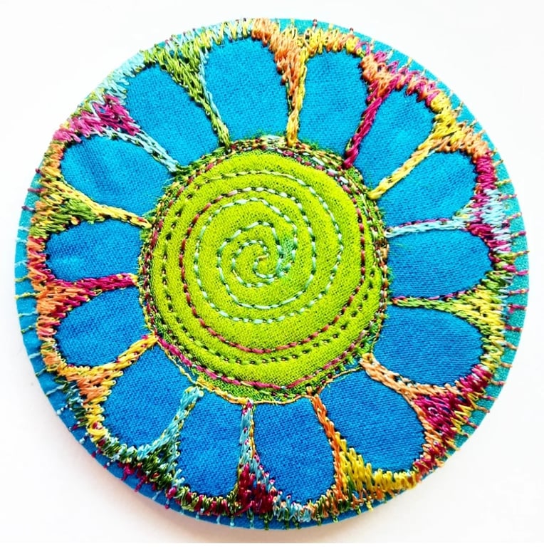 Badge 58mm Fabric Badge with Free Machine Embroidery Blue and Green Flower 