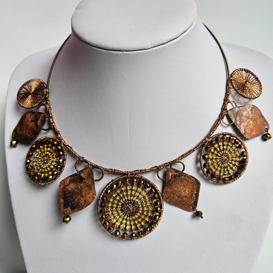 Necklace featuring Dorset Buttons with copper pendants and beads