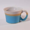 Wheel thrown smaller Sun Yellow stripe mug.