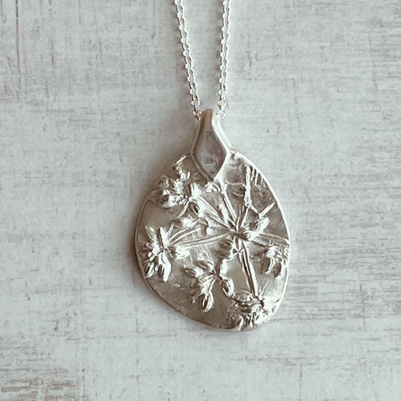 Sterling silver  botanical pendant with dill seed head design.