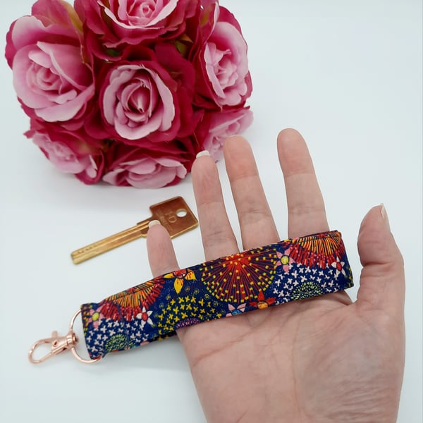 Navy and raspberry pink dandelion burst keyfob wristlet,  keyring. 