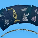 Pack of 4 Hand printed black Christmas cards with pearlescent pastel trees 