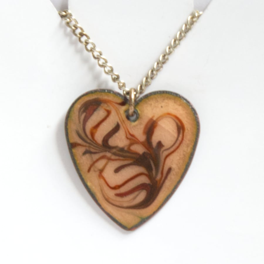 red-brown scrolled over golden brown, heart pendant