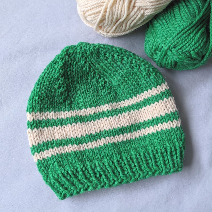 Green and white knitted hat for toddler