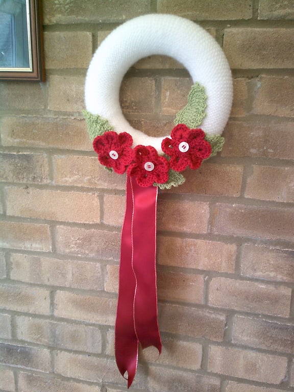 25cm Hand Knitted Wreath in White with Dark Red Flowers and Green Leaves