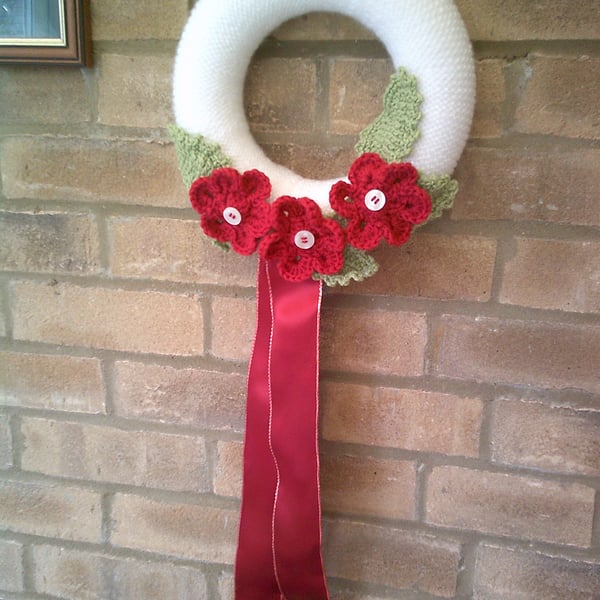 25cm Hand Knitted Wreath in White with Dark Red Flowers and Green Leaves