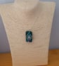 Emerald Glass and Silver Spiral Pendant - Image 8