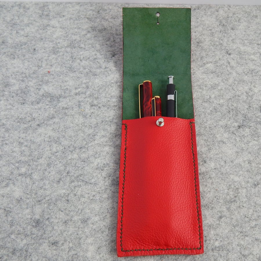 Red Leather Pen Case with Green Suede lining. 