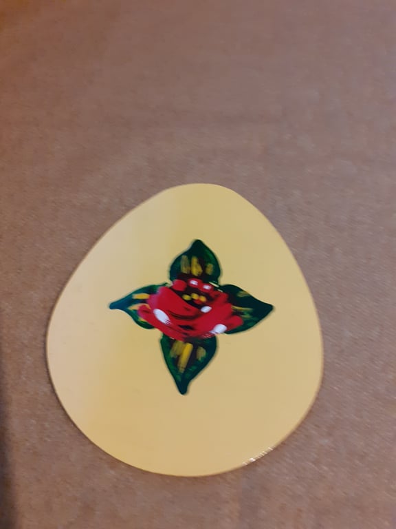 Egg shaped wooden magnet with canal art style rose