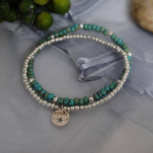 Turquoise and silver bracelet with star coin