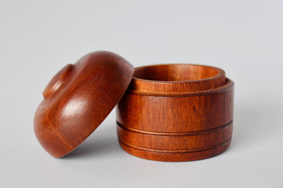 Beautiful, hand-turned mahogany, pull top pot.