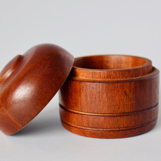 Beautiful, hand-turned mahogany, pull top pot.