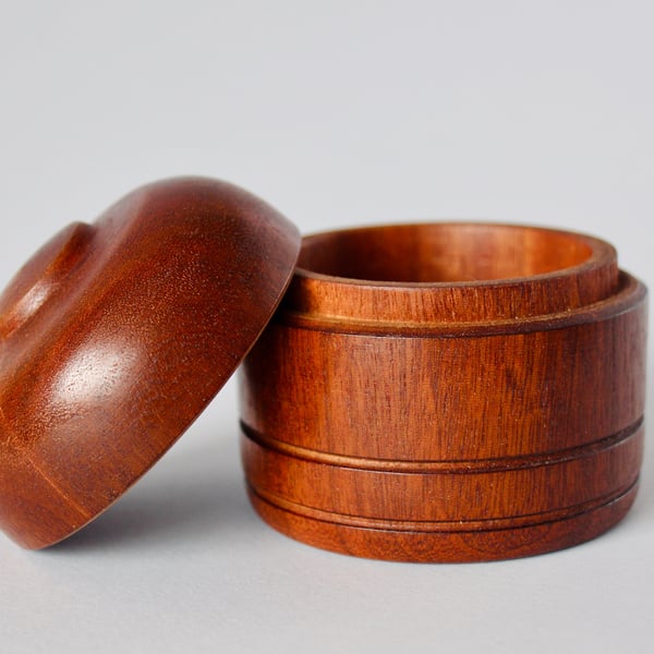 Beautiful, hand-turned mahogany, pull top pot.