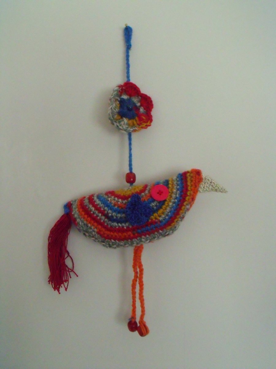bright colourful crocheted hanging bird decoration for your wall or twig tree