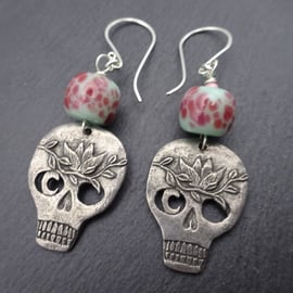 green and pink lampwork glass skull earrings
