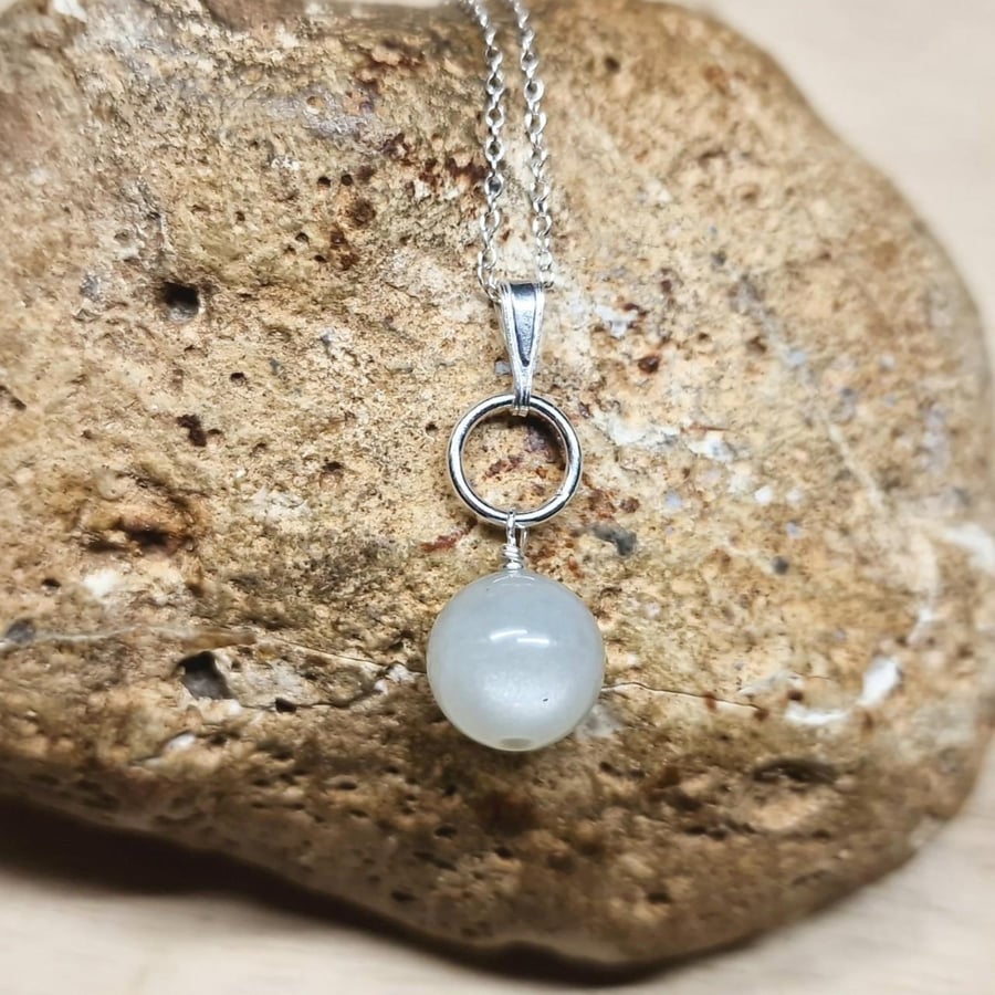 Small White Moonstone Pendant. Sterling silver circle. June's Birthstone