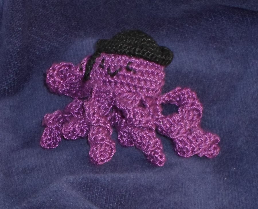 Bernie the business octopus crochet brooch