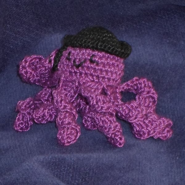 Bernie the business octopus crochet brooch