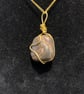 Beautiful wire wrapped brown pebble pendant on gold coloured chain.  - Image 2