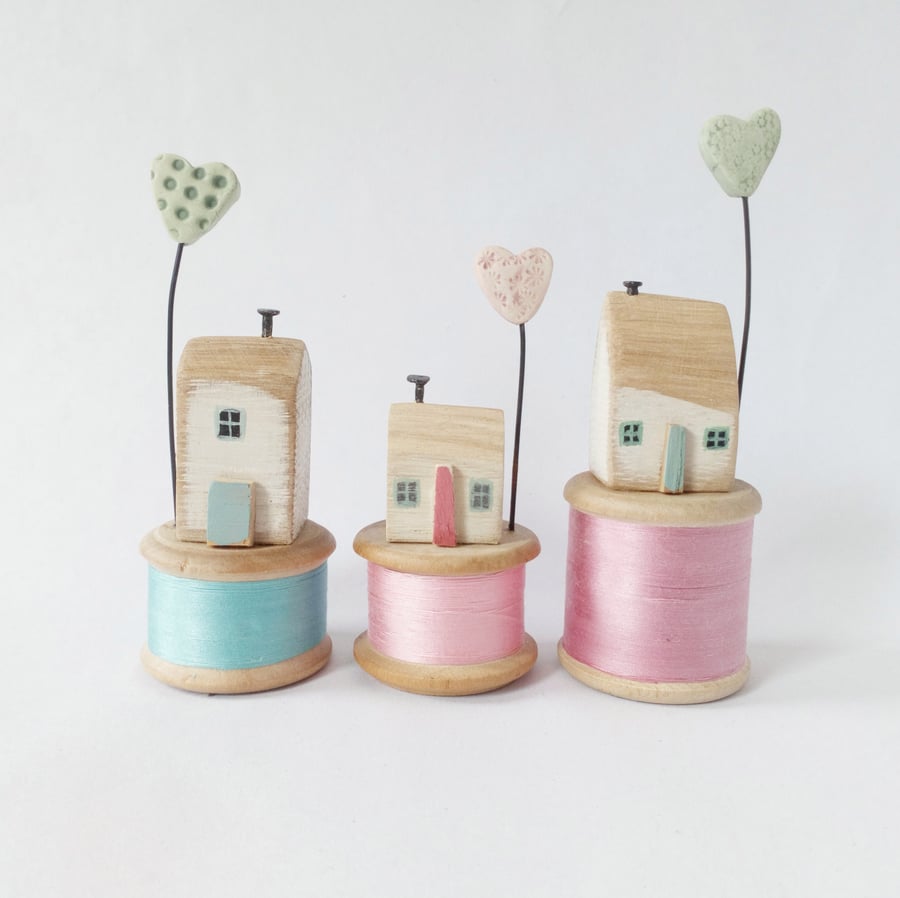 SALE-Wooden house with clay heart on a vintage wooden bobbin