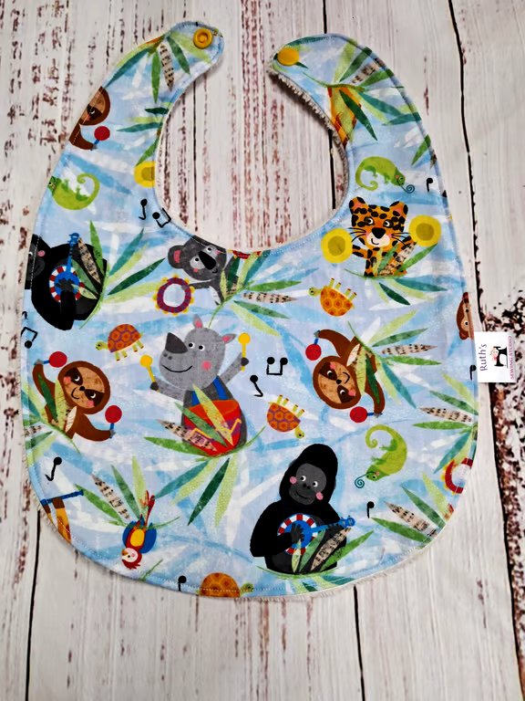 Toddler bamboo bib with musical animals - size 12 months plus