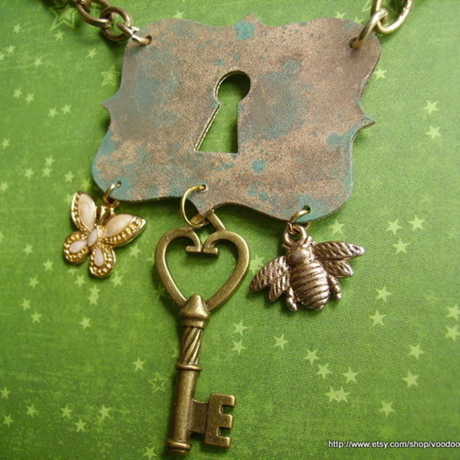 Steampunk key and insect necklace