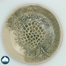 Ceramic garlic grater with lace detail