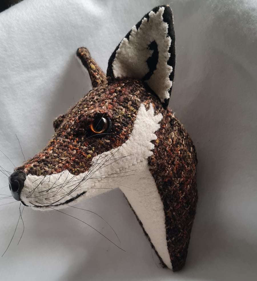 Faux fox wall mount in brown coloured tweed