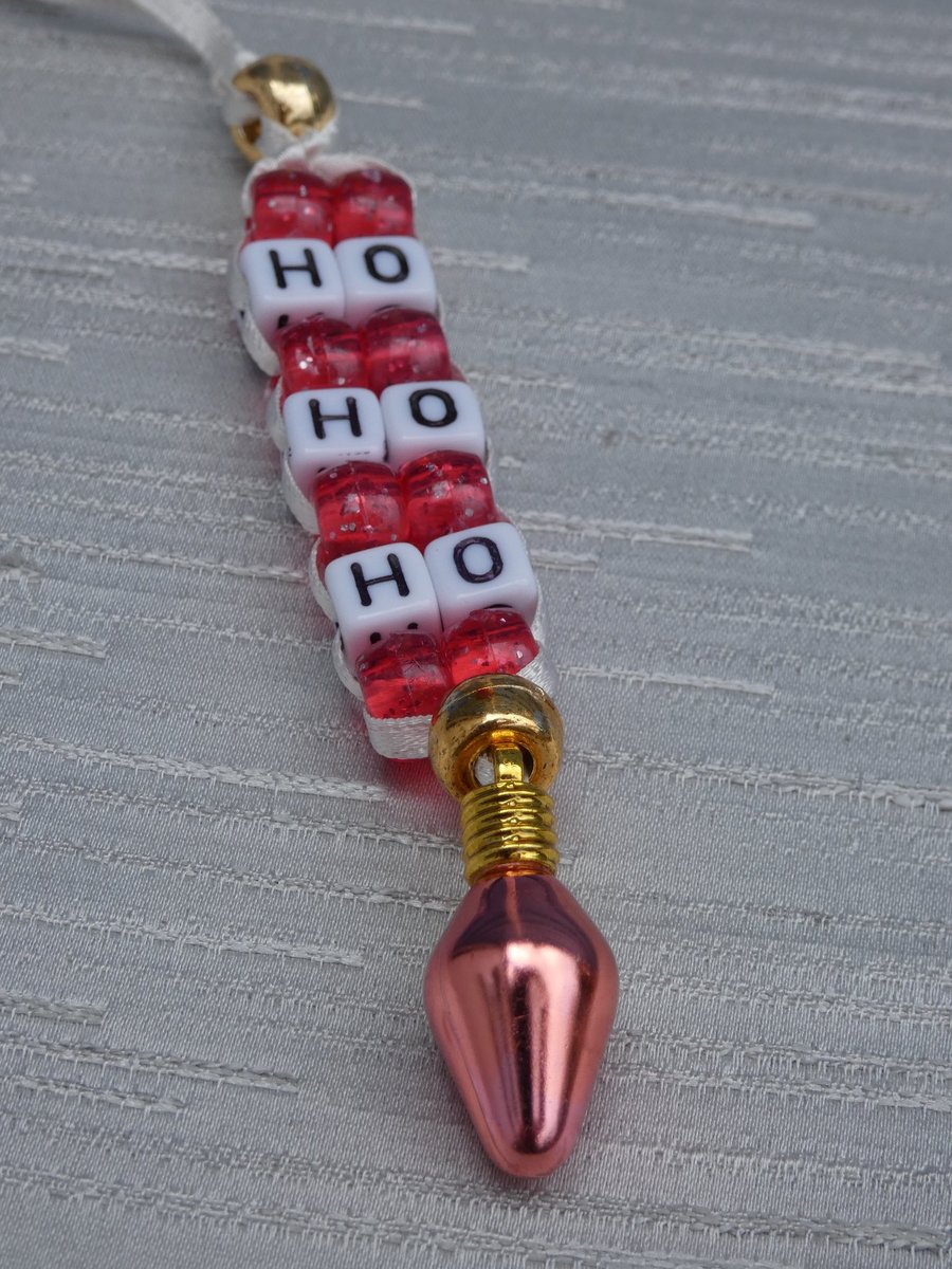 'Ho, Ho, Ho' beaded Christmas tree decoration, with 'fairy light' charm
