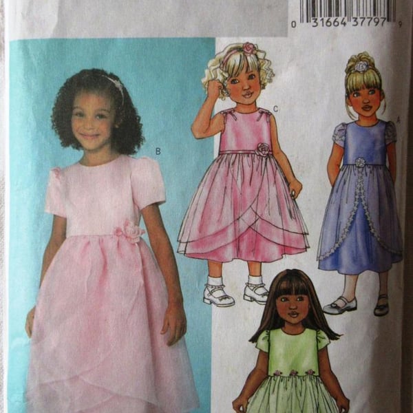 A sewing pattern for a little girl's bridesmaid's dress with overskirt in size 2