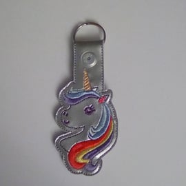 665. Unicorn keyring.