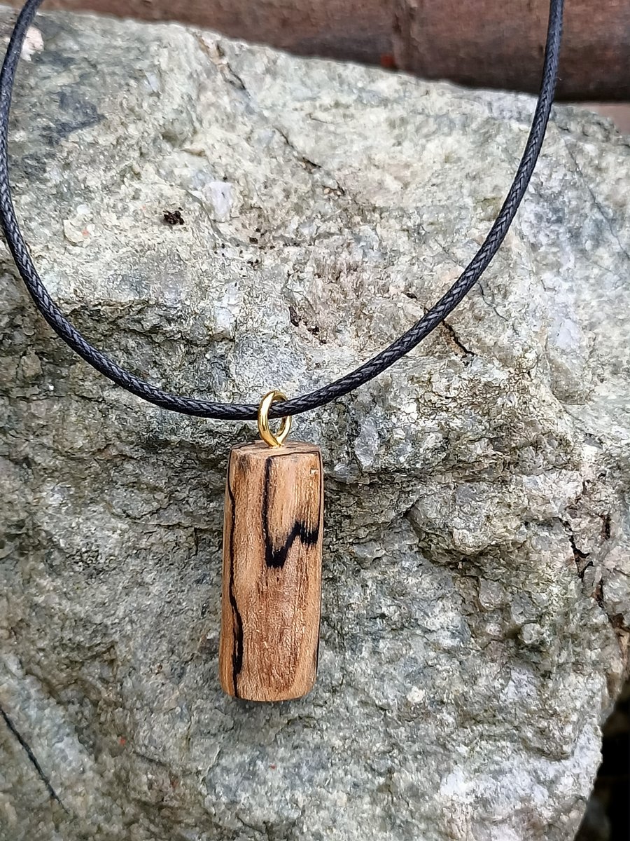 Wooden festival pendant