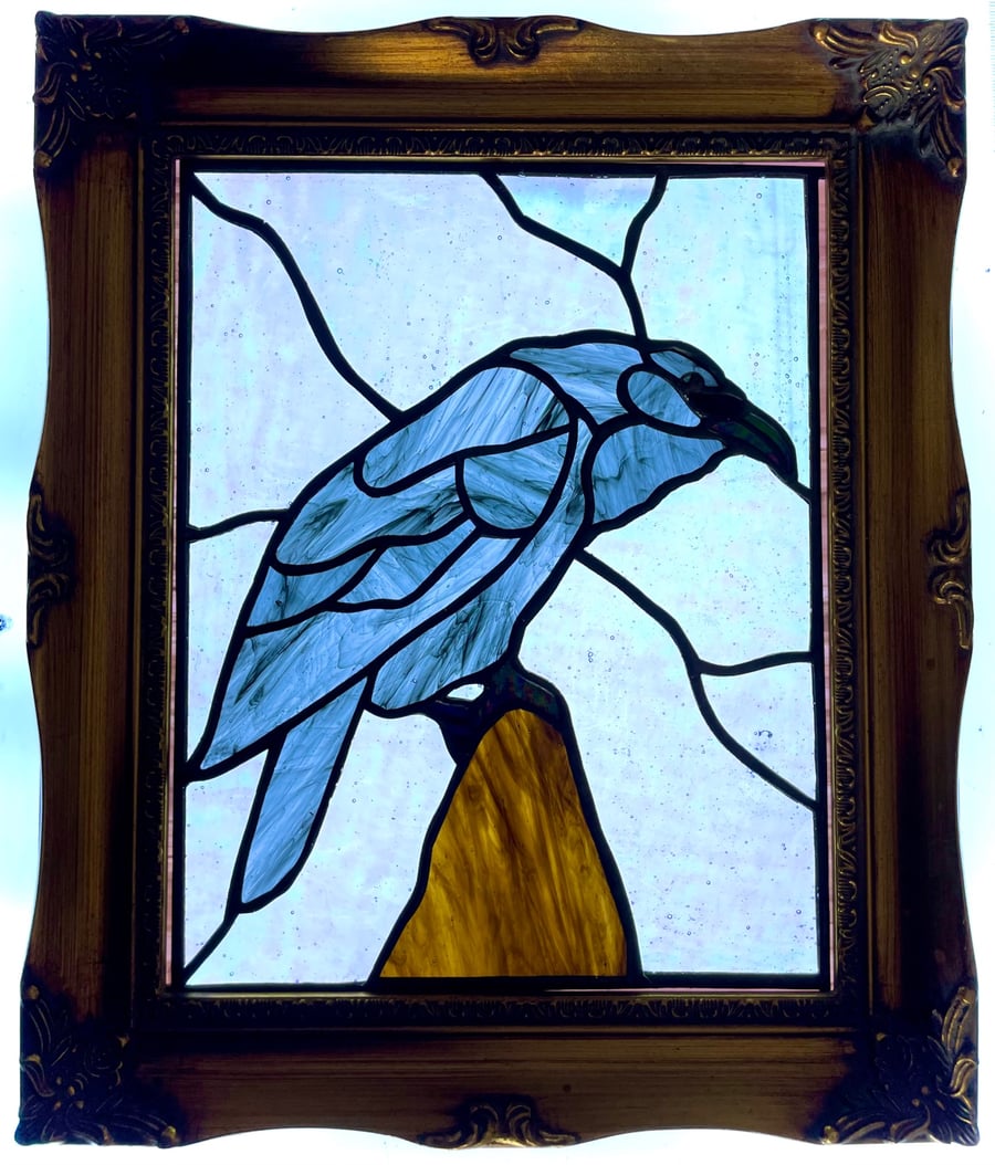 Stained glass raven in vintage frame 