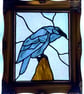 Stained glass raven in vintage frame 