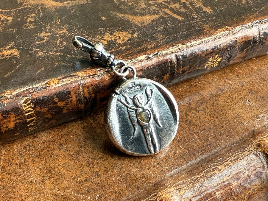 Double sided Memento Mori Wax Imp Fairy Clip On Pendant 
