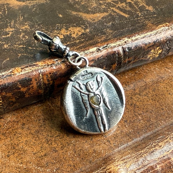 Double sided Memento Mori Wax Imp Fairy Clip On Pendant 