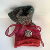 Pretty knitted gift bag with silver button