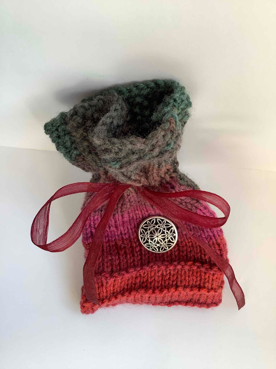 Pretty knitted gift bag with silver button