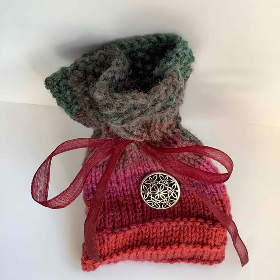 Pretty knitted gift bag with silver button