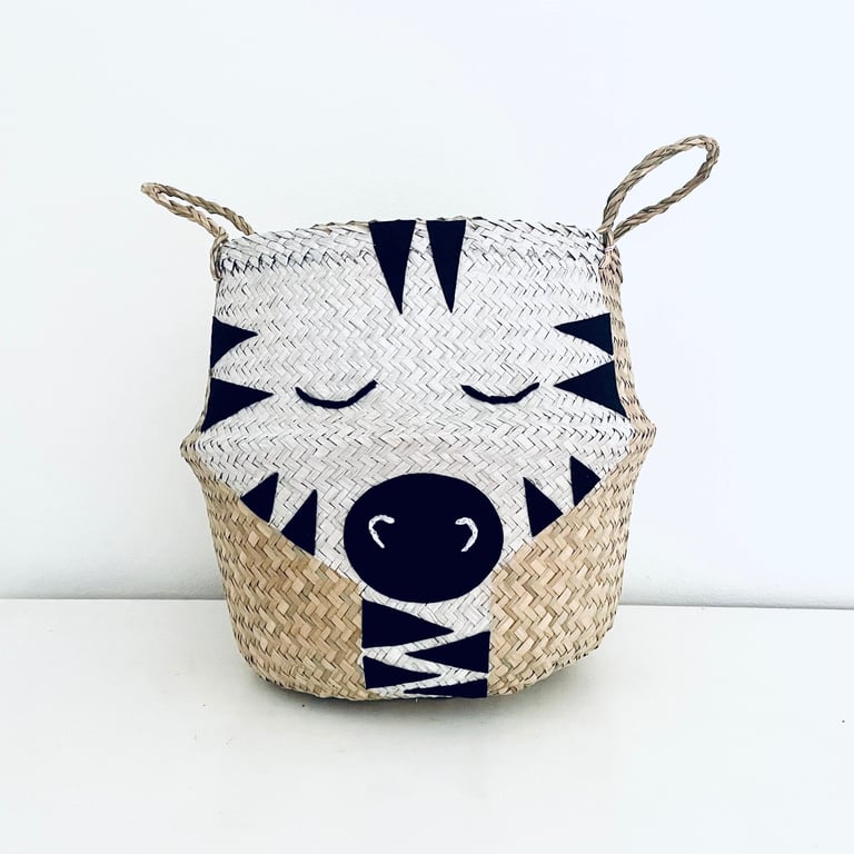 Zebra belly basket with a beautiful painted and embroidered face. 